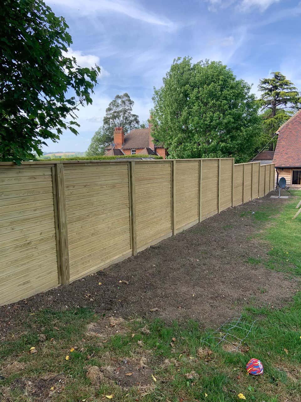 This is a photo of an acoustic fence installed by Fast Fix Fencing Uckfield